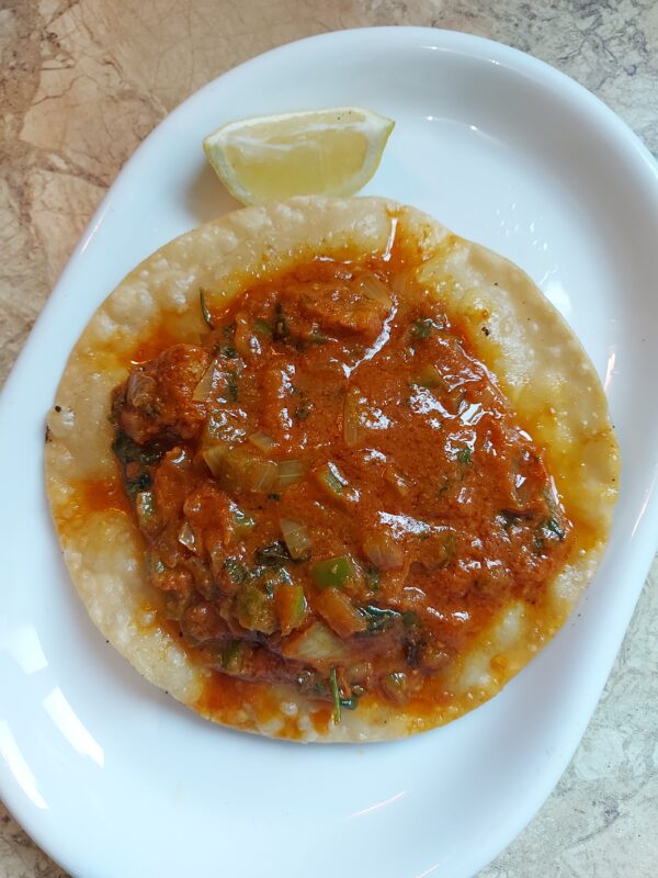 lamb tikka on puri